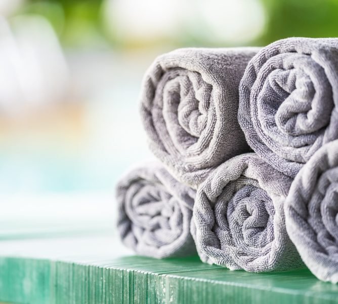 Towel pool around swimming pool for leisure relax